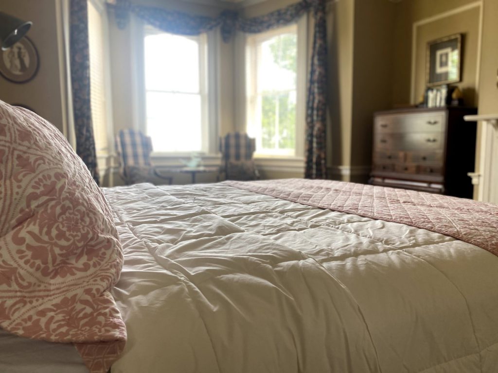 A photo of the new king bed in the master bedroom of the Broughton Street House